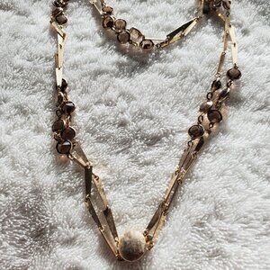 A Gold Necklace with light brown crystal gem stones , wt. 24 grams, item # A-113